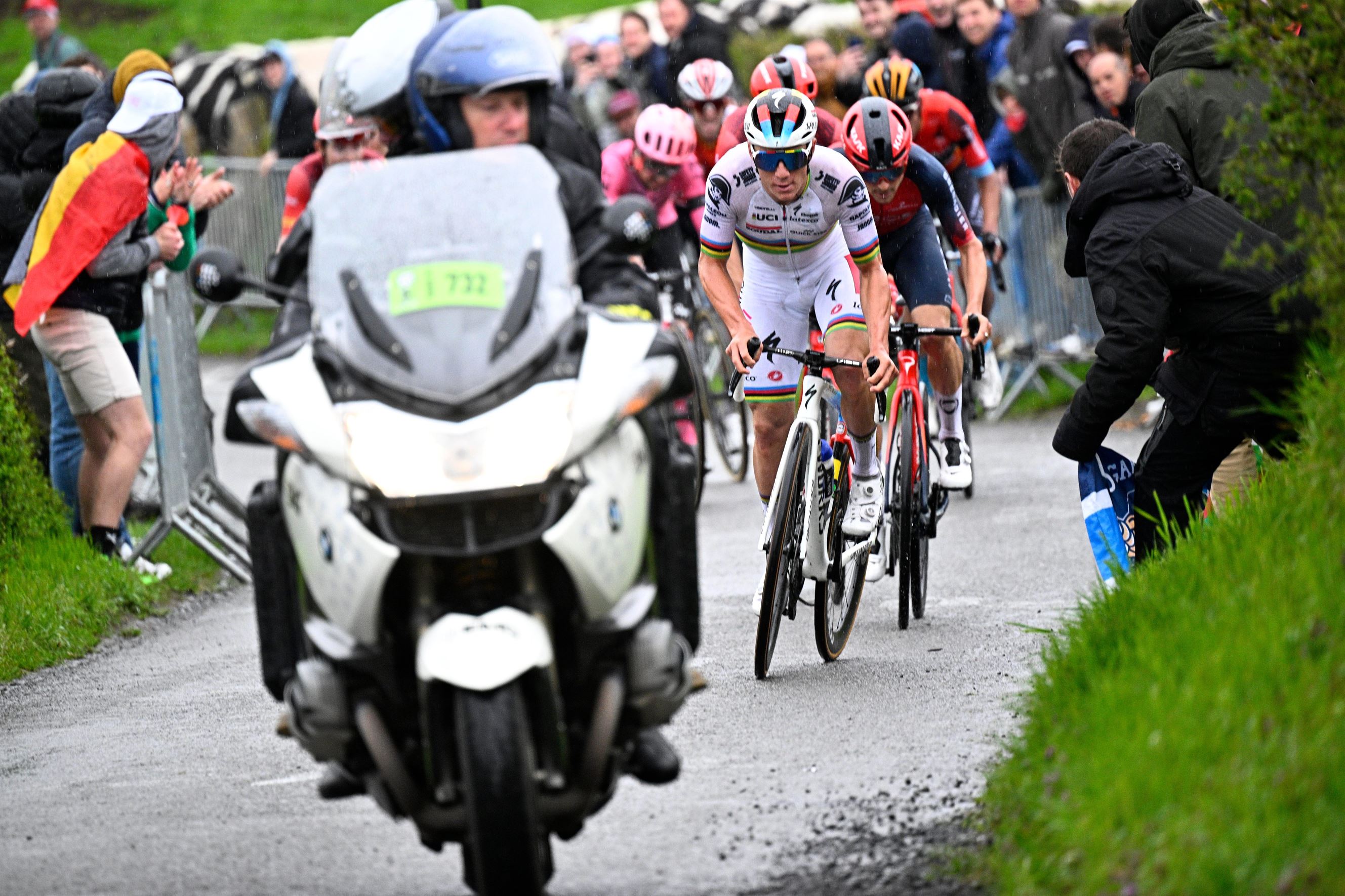 Remco Evenpoel rides behind a tv motorbike at Liege bastogne Liege